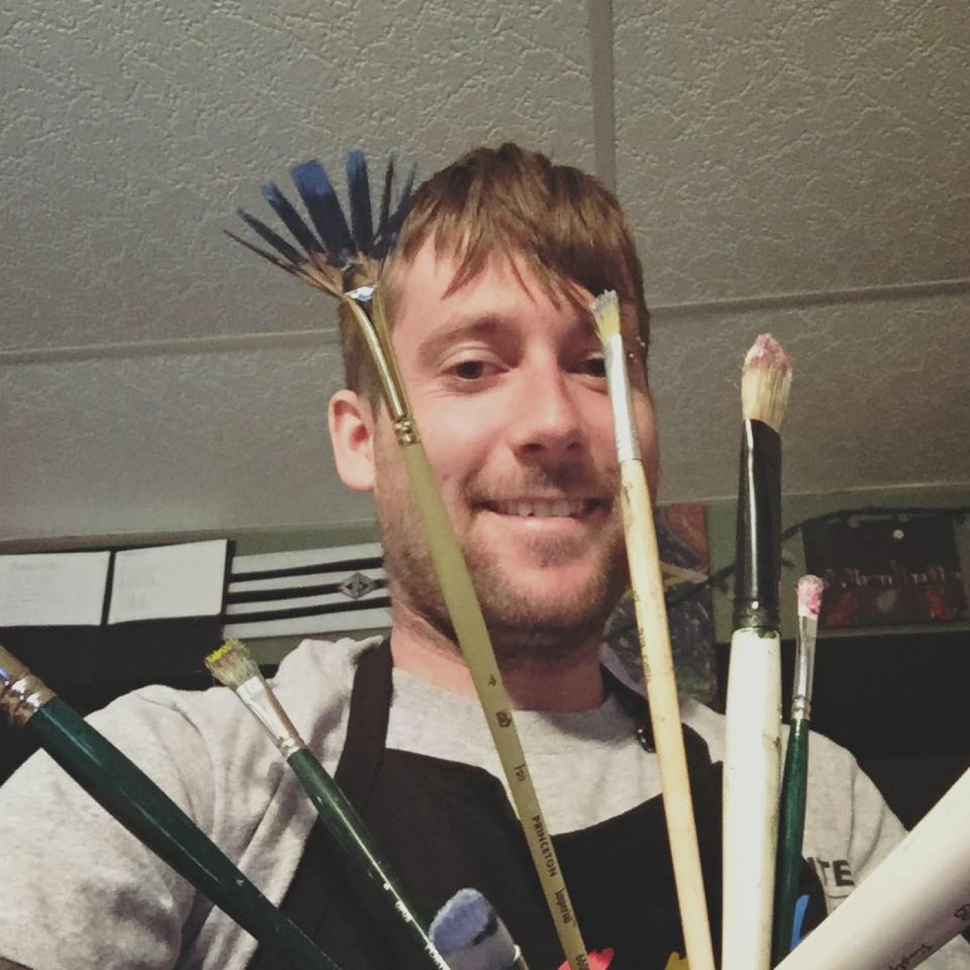 Cam John's brushes and palette in the studio